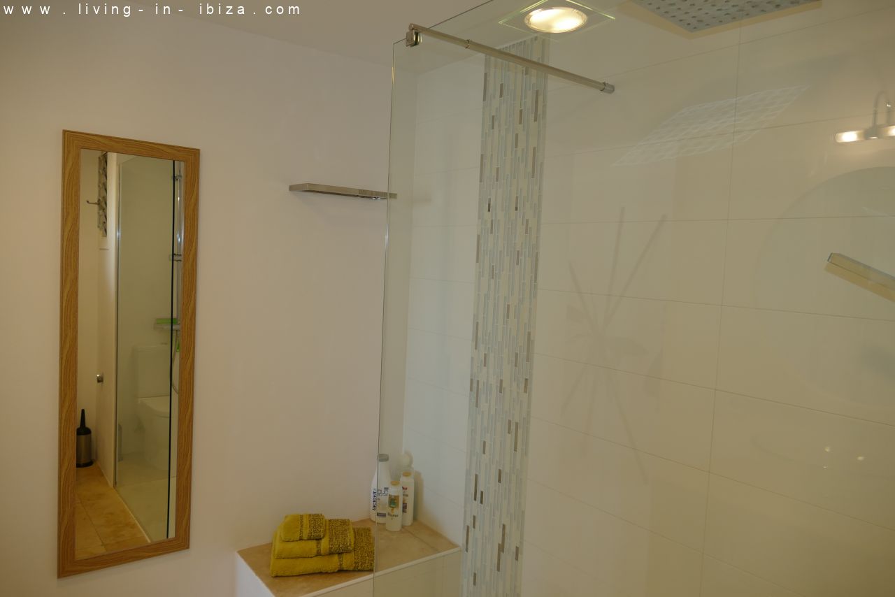 Seasonal temporary rental, cozy studio apartment with sea views on first line on promenade of Santa Eulalia del Rio, Ibiza.