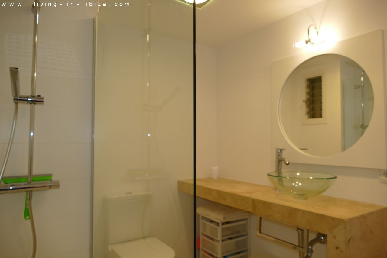 Seasonal temporary rental, cozy studio apartment with sea views on first line on promenade of Santa Eulalia del Rio, Ibiza.