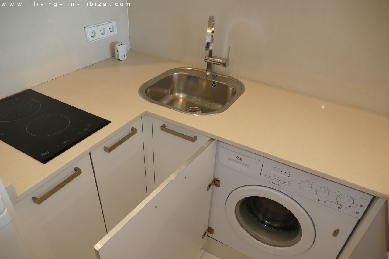 Seasonal temporary rental, cozy studio apartment with sea views on first line on promenade of Santa Eulalia del Rio, Ibiza.