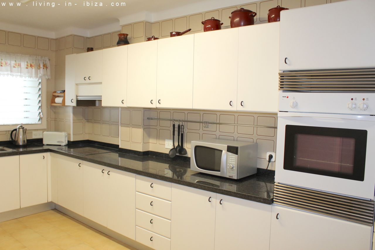 Seasonal rental in Santa Eulalia del Rio, Ibiza. Ample apartment first line sea views on beach