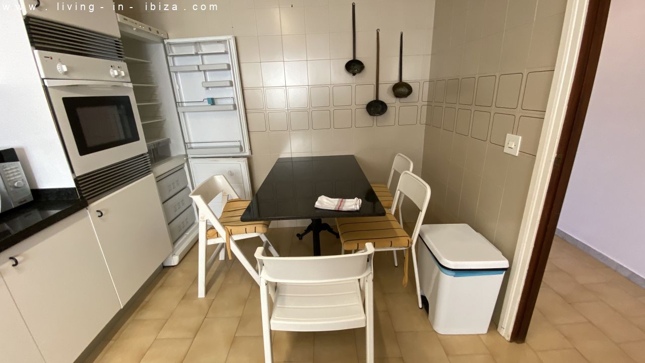 Seasonal rental in Santa Eulalia del Rio, Ibiza. Ample apartment first line sea views on beach