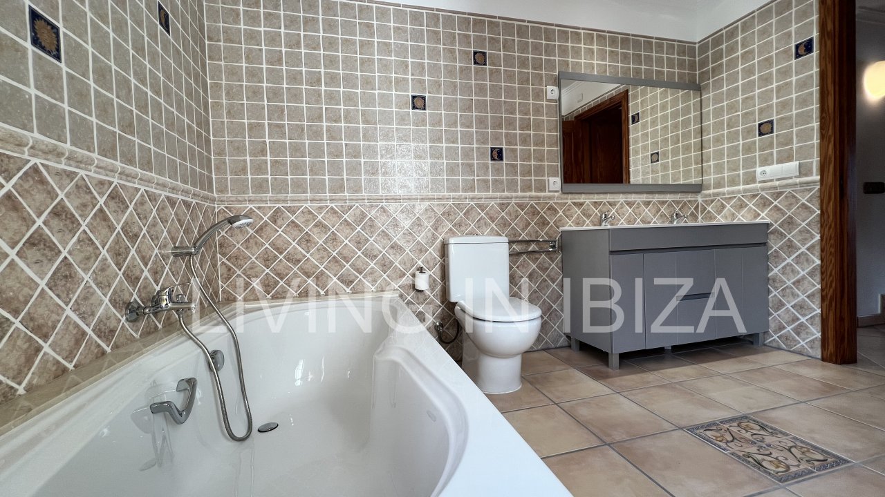 Long term rental / annual contract. Charming two-storey house in Siesta, Santa Eulalia, Ibiza. Stunning sea views from the terrace.
