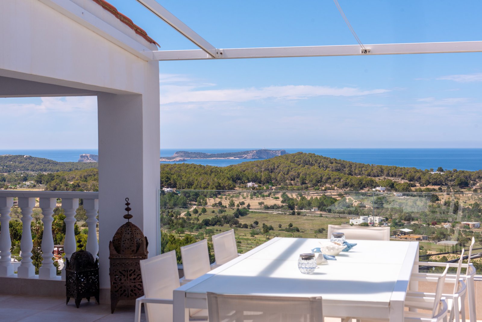Stunning 8 bedroom, 3 storey villa with private pool and 180 degree sea and sunset views. Nestled on a mountain hill of Ibiza, Cala Conta
