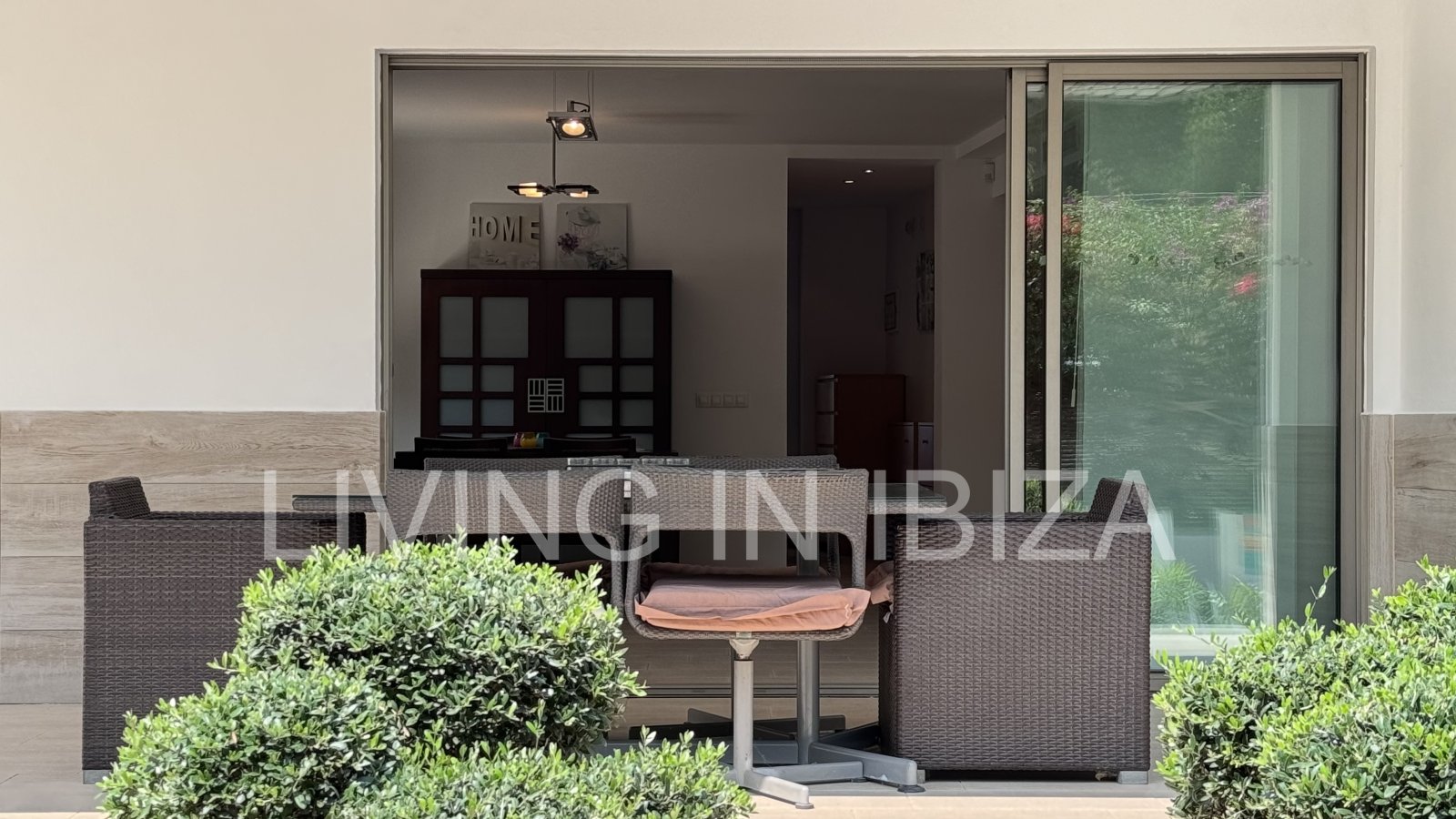 Bright and comfortable 2 bedroom ground floor apartment with terrace, pool, garage, near the beach in Santa Eulalia, Ibiza for long term rental