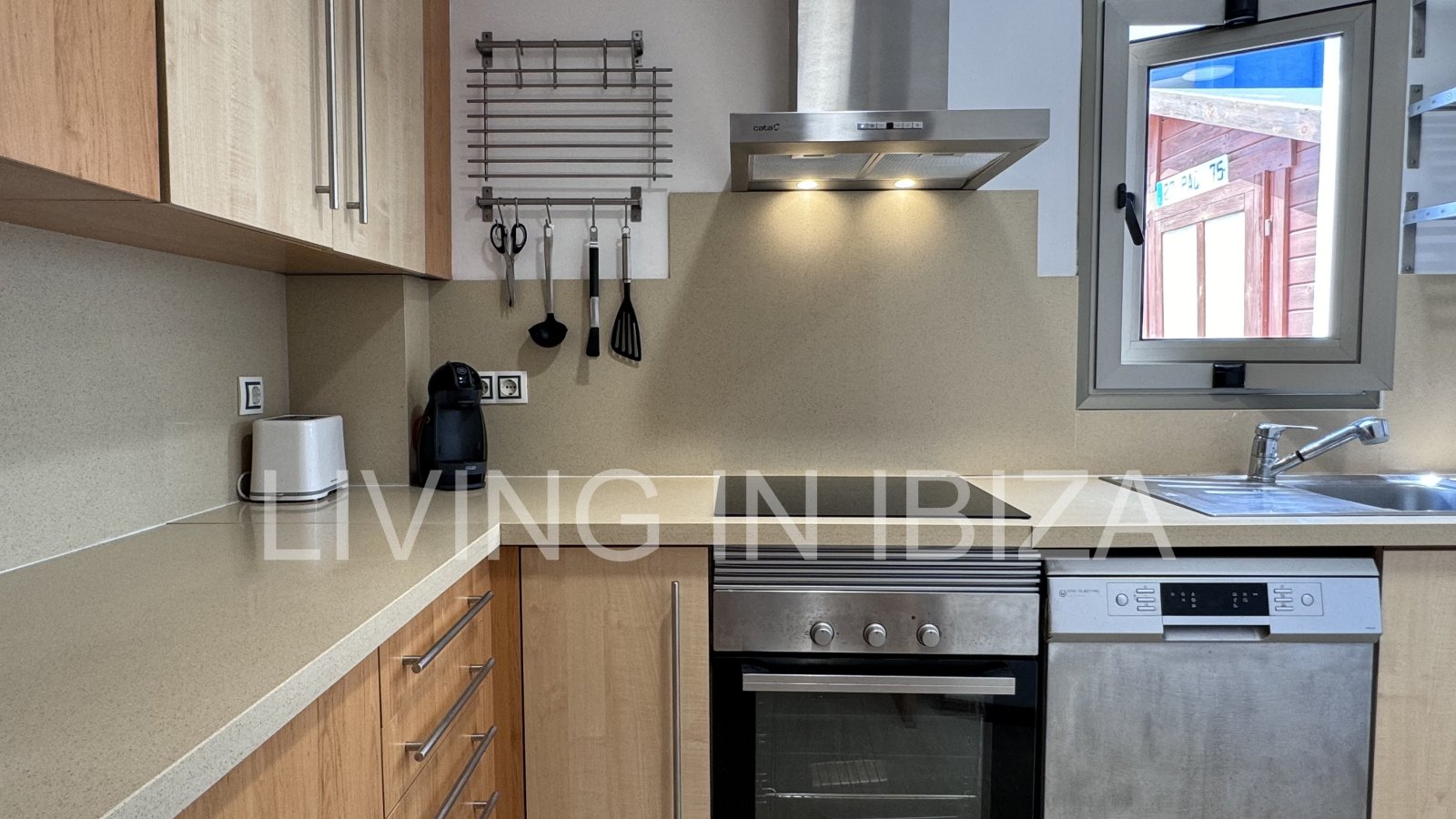 Bright and comfortable 2 bedroom ground floor apartment with terrace, pool, garage, near the beach in Santa Eulalia, Ibiza for long term rental