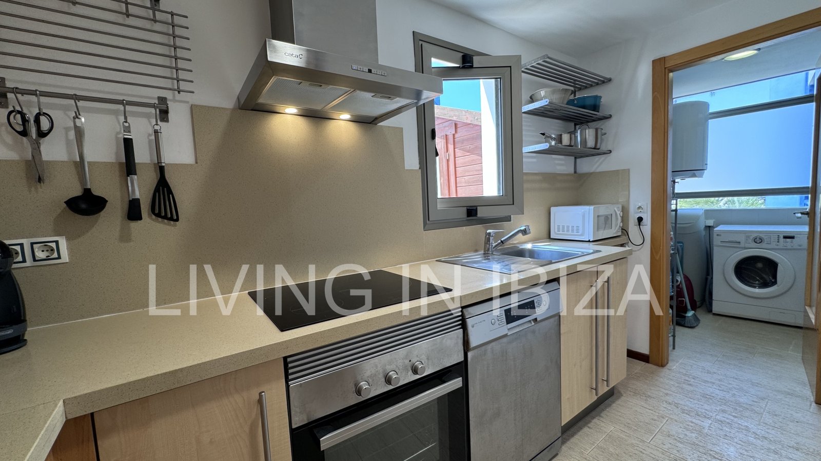 Bright and comfortable 2 bedroom ground floor apartment with terrace, pool, garage, near the beach in Santa Eulalia, Ibiza for long term rental