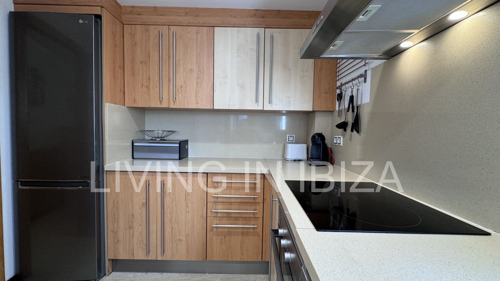 Bright and comfortable 2 bedroom ground floor apartment with terrace, pool, garage, near the beach in Santa Eulalia, Ibiza for long term rental