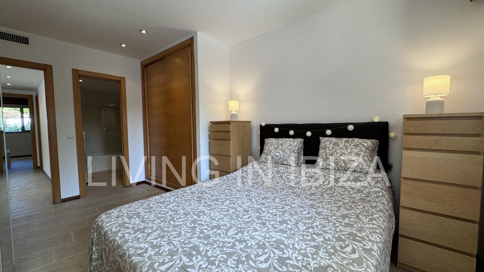 Bright and comfortable 2 bedroom ground floor apartment with terrace, pool, garage, near the beach in Santa Eulalia, Ibiza for long term rental