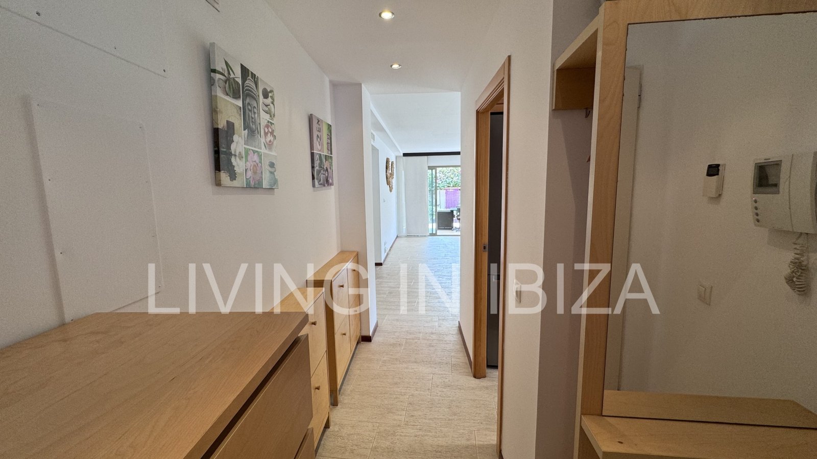 Bright and comfortable 2 bedroom ground floor apartment with terrace, pool, garage, near the beach in Santa Eulalia, Ibiza for long term rental