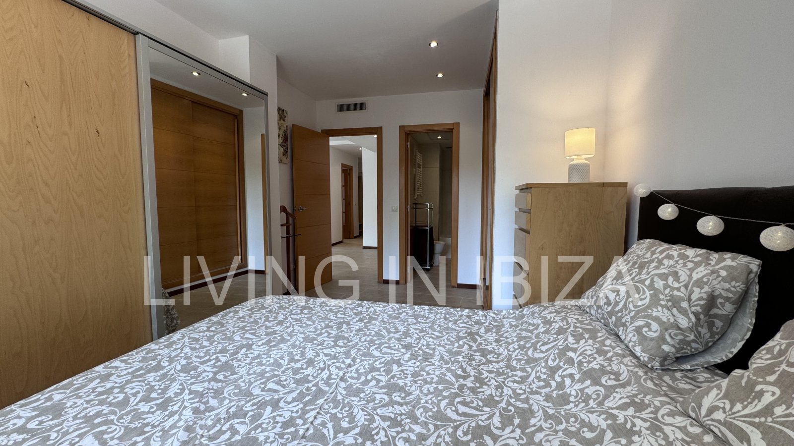 Bright and comfortable 2 bedroom ground floor apartment with terrace, pool, garage, near the beach in Santa Eulalia, Ibiza for long term rental