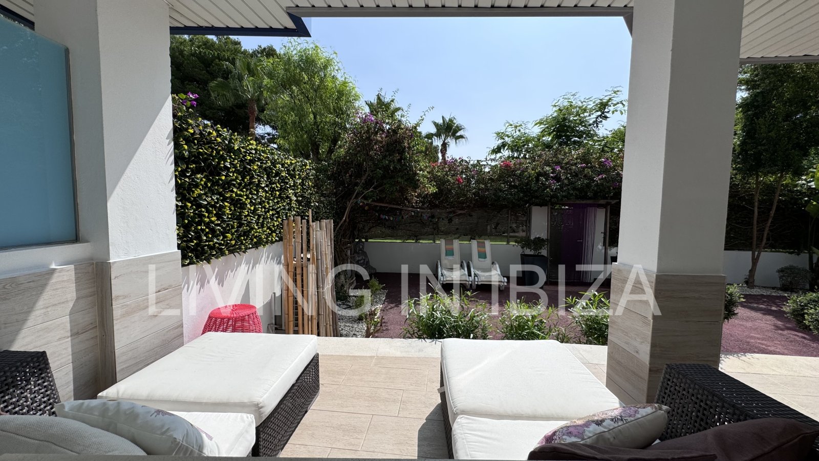 Bright and comfortable 2 bedroom ground floor apartment with terrace, pool, garage, near the beach in Santa Eulalia, Ibiza for long term rental