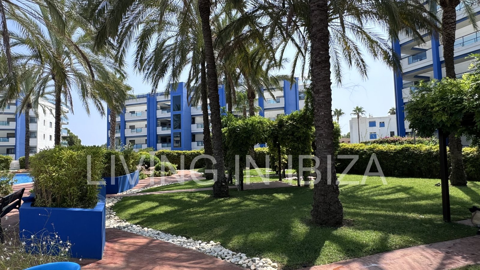 Bright and comfortable 2 bedroom ground floor apartment with terrace, pool, garage, near the beach in Santa Eulalia, Ibiza for long term rental