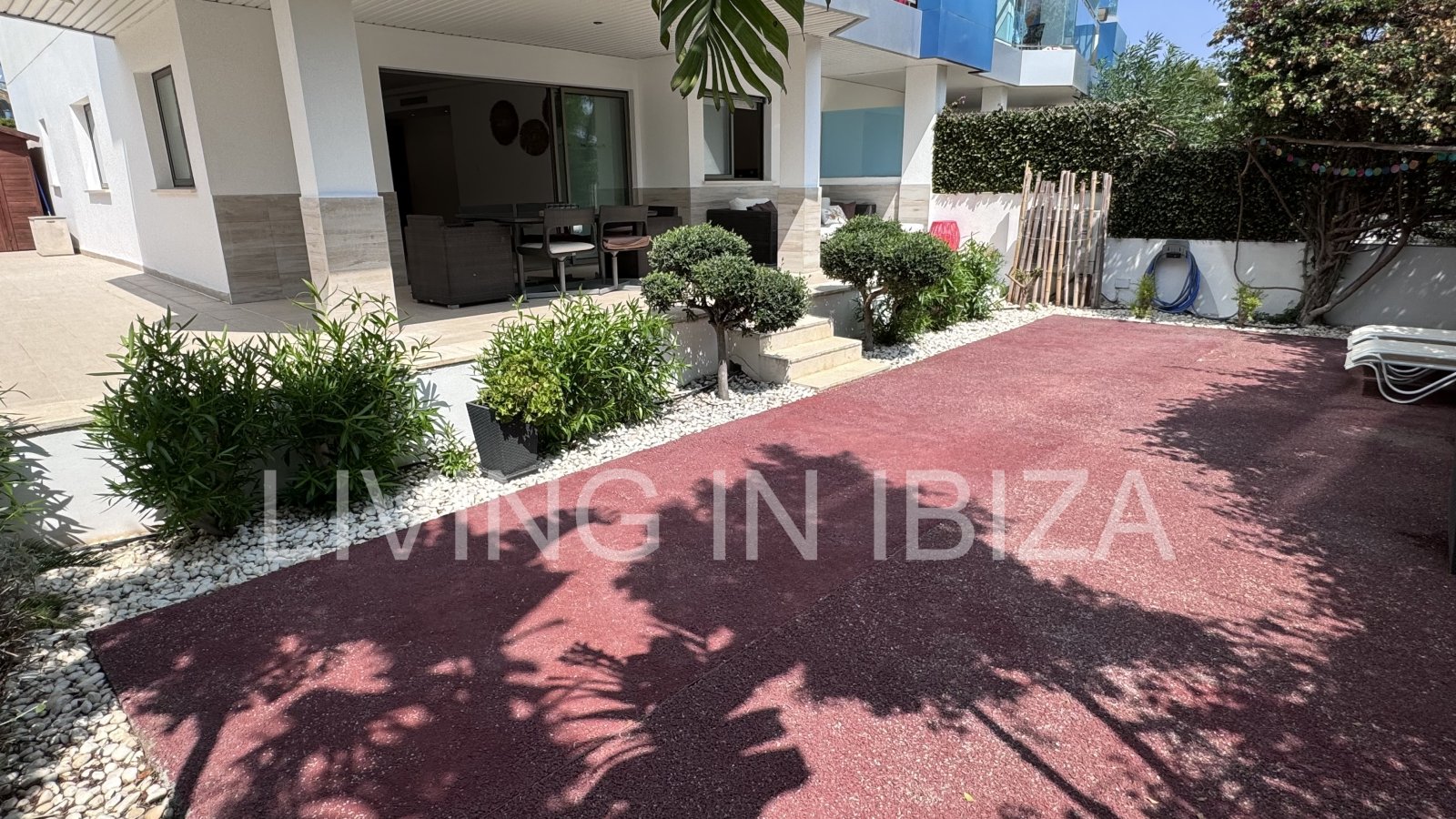 Bright and comfortable 2 bedroom ground floor apartment with terrace, pool, garage, near the beach in Santa Eulalia, Ibiza for long term rental
