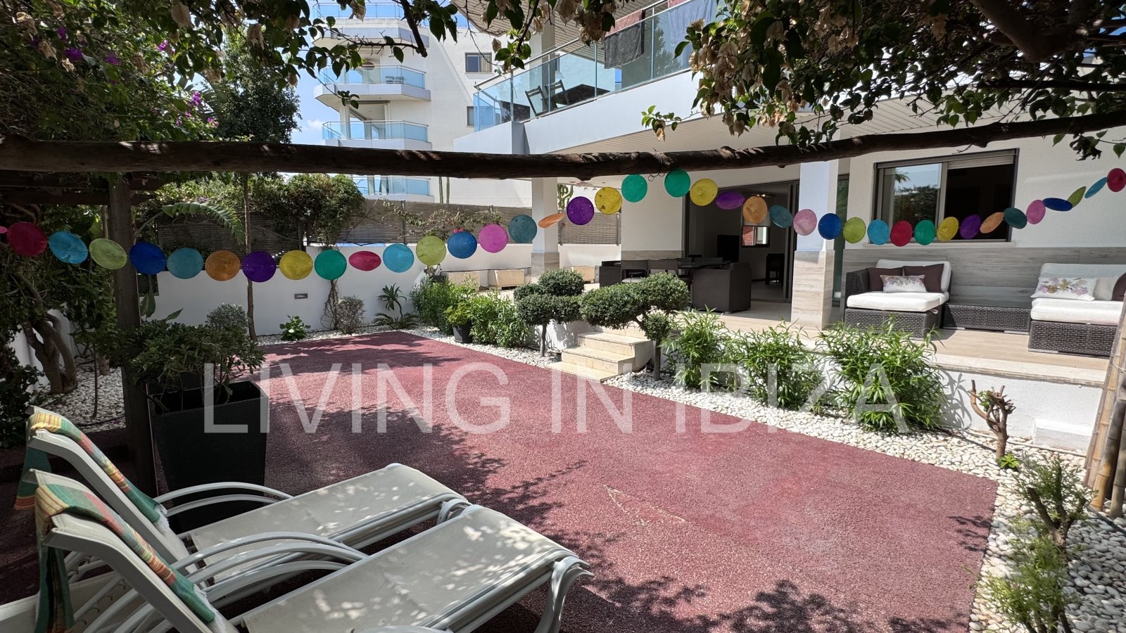 Bright and comfortable 2 bedroom ground floor apartment with terrace, pool, garage, near the beach in Santa Eulalia, Ibiza for long term rental