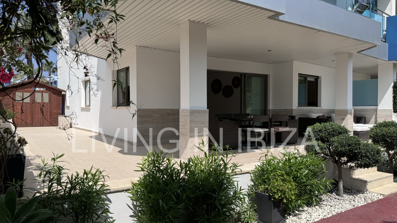 Bright and comfortable 2 bedroom ground floor apartment with terrace, pool, garage, near the beach in Santa Eulalia, Ibiza for long term rental