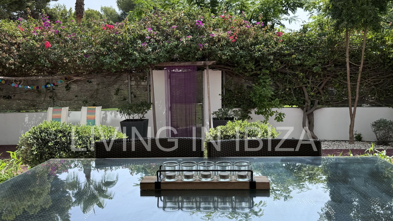 Bright and comfortable 2 bedroom ground floor apartment with terrace, pool, garage, near the beach in Santa Eulalia, Ibiza for long term rental