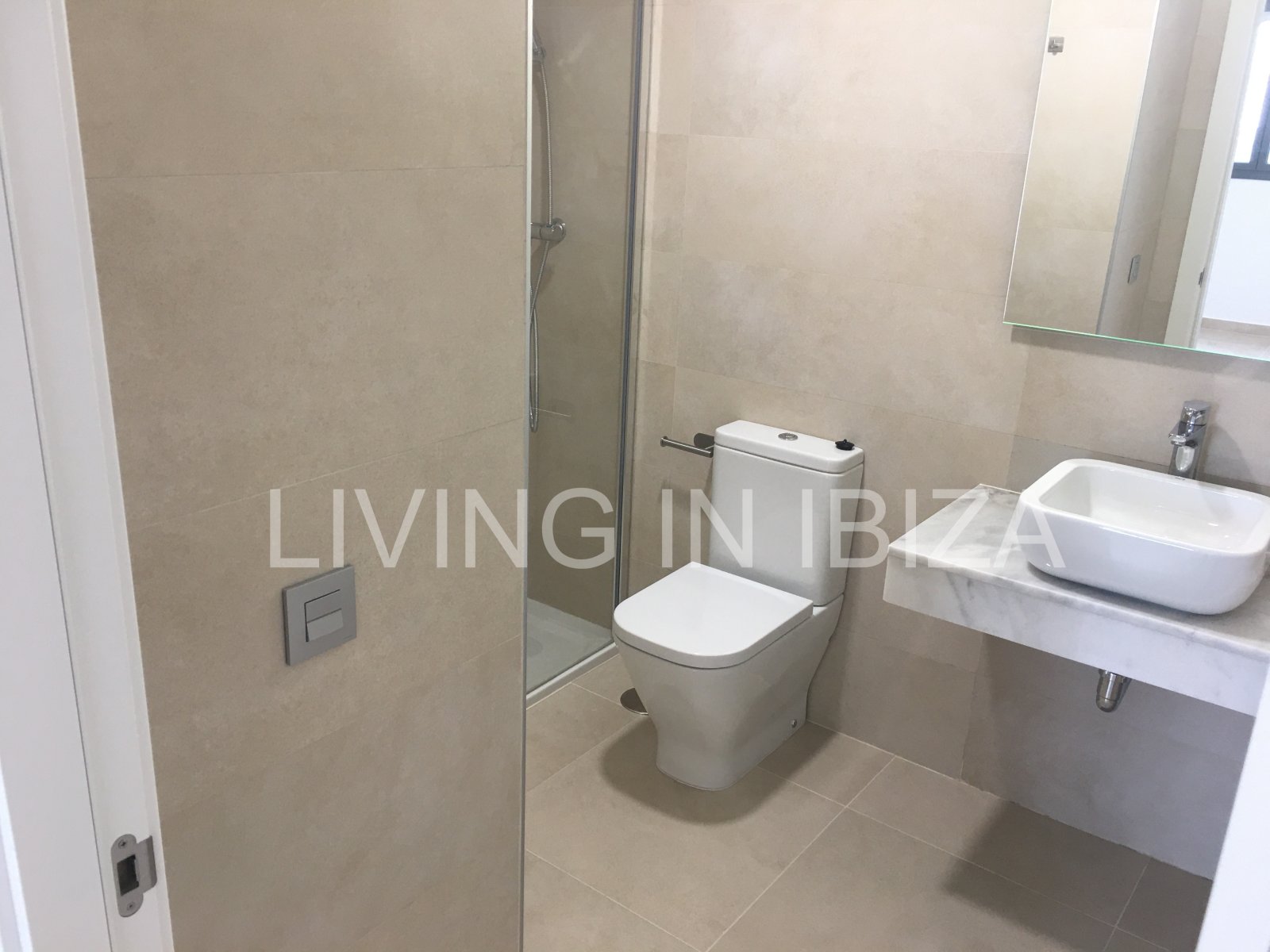 Penthouse Tagomago, is an attractive and modern brand new unfurnished penthouse in a luxury development in the town of Santa Eulalia del Rio