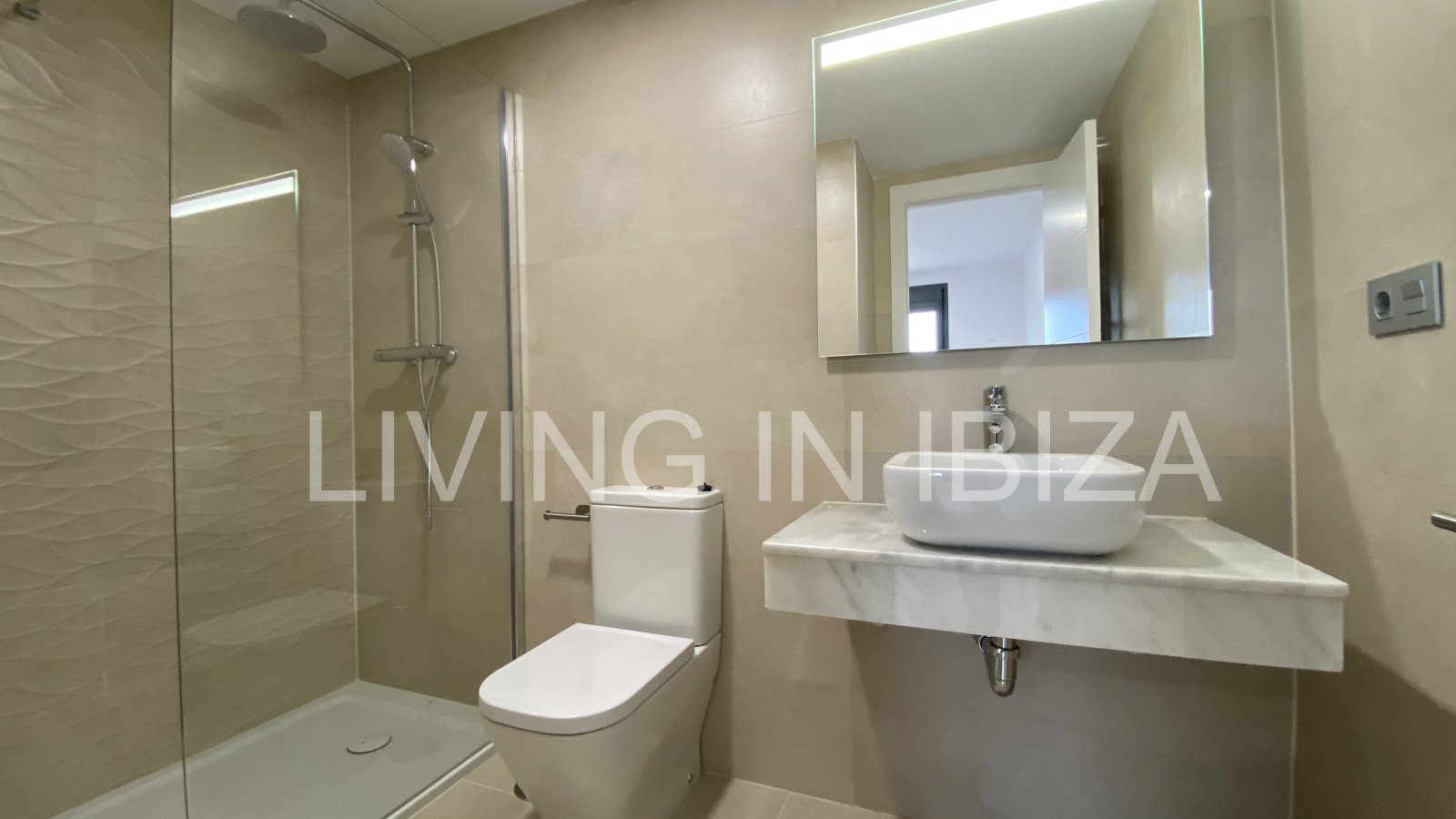 Penthouse Tagomago, is an attractive and modern brand new unfurnished penthouse in a luxury development in the town of Santa Eulalia del Rio