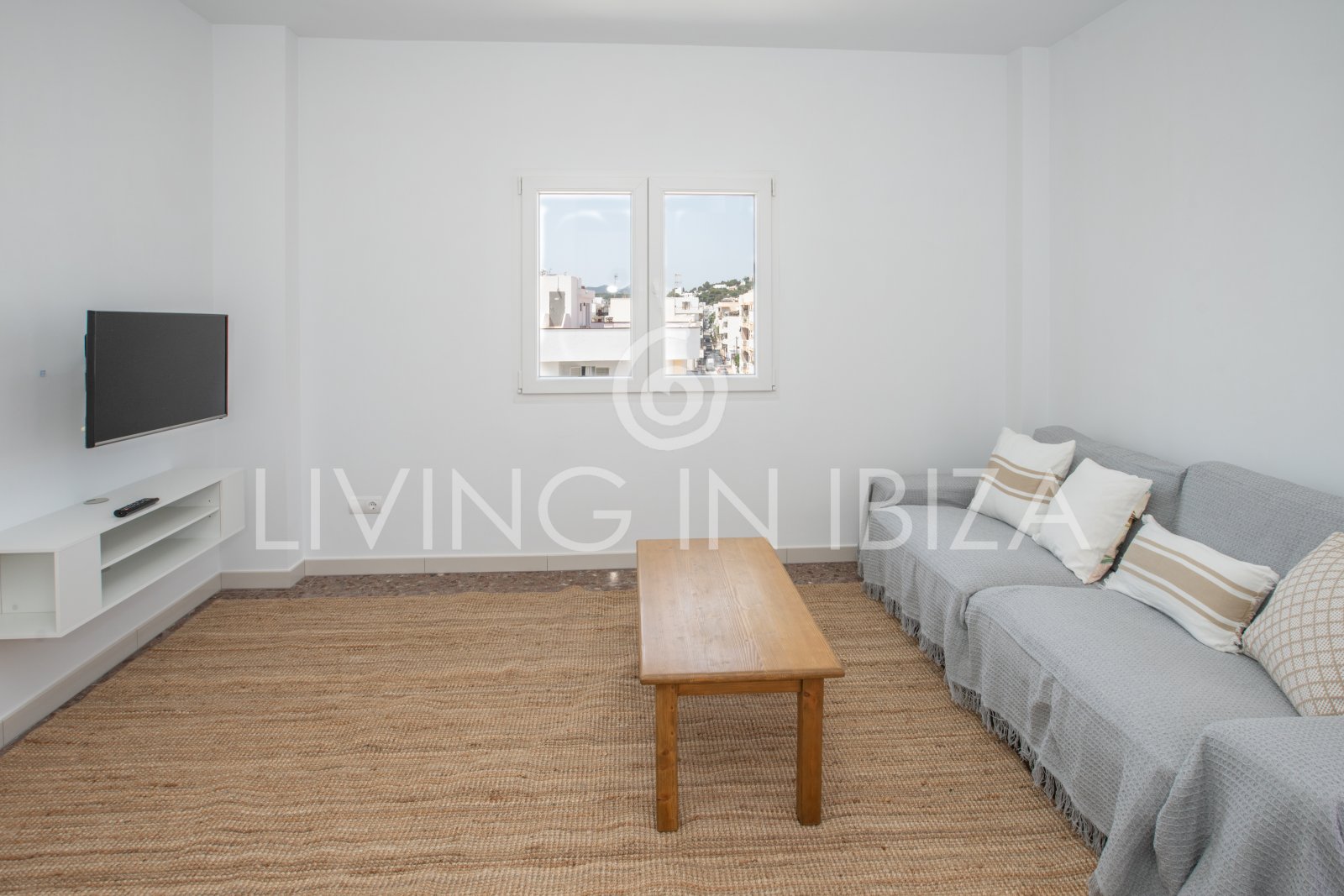 For sale. This cosy Mediterranean-style apartment, located in Santa Eulalia del Río (Ibiza).  