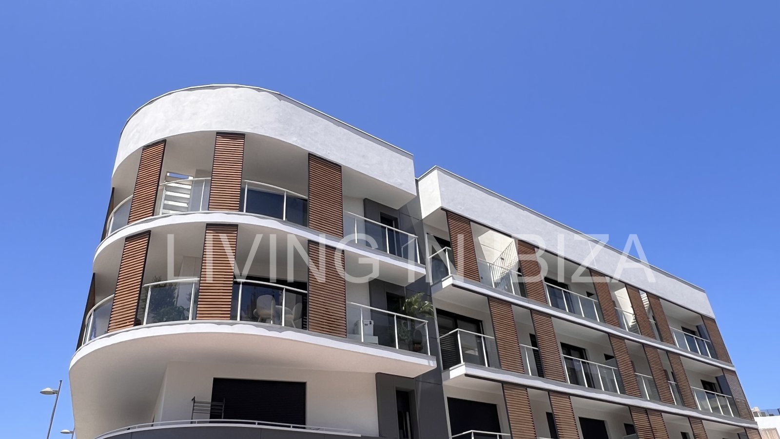 Santa Eulalia del Rio: Annual rental. Available 15th July. Attractive and modern new unfurnished flat, with communal pool, parking, in Santa Eulalia, Ibiza. 