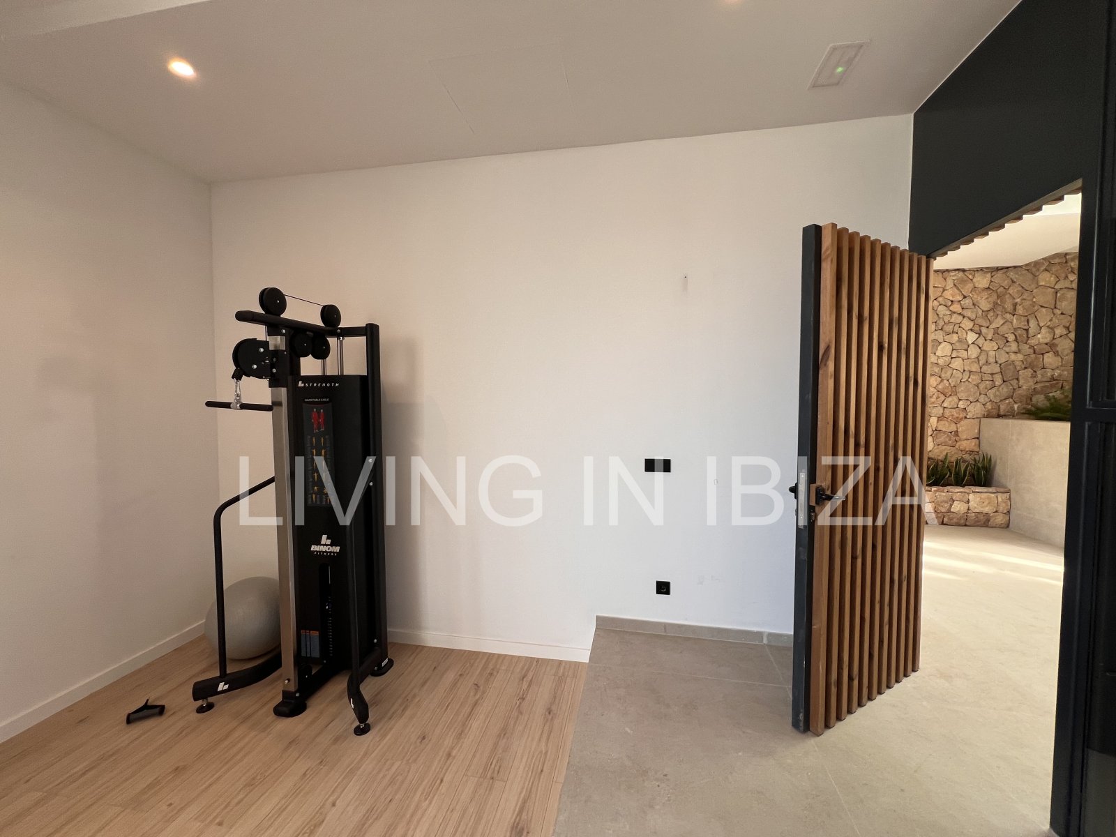 Annual rental. Available 15th July. Attractive and modern new unfurnished flat, with communal pool, parking, in Santa Eulalia, Ibiza.