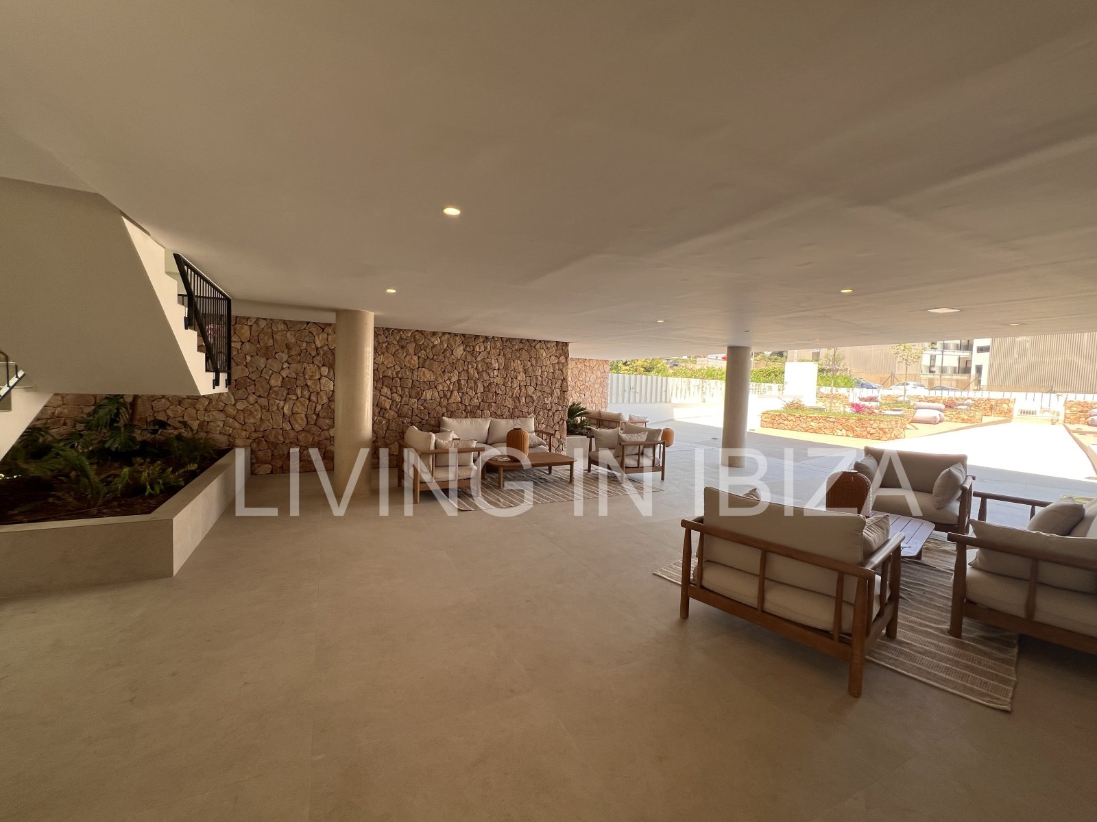 Annual rental. Available 15th July. Attractive and modern new unfurnished flat, with communal pool, parking, in Santa Eulalia, Ibiza.