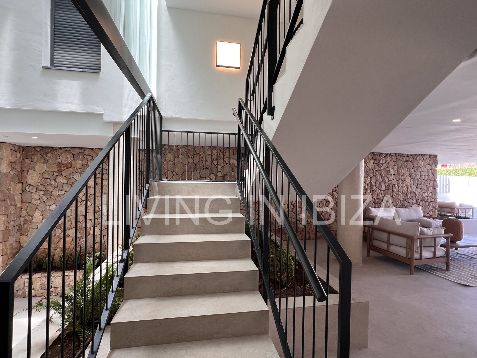 Annual rental. Available 15th July. Attractive and modern new unfurnished flat, with communal pool, parking, in Santa Eulalia, Ibiza.