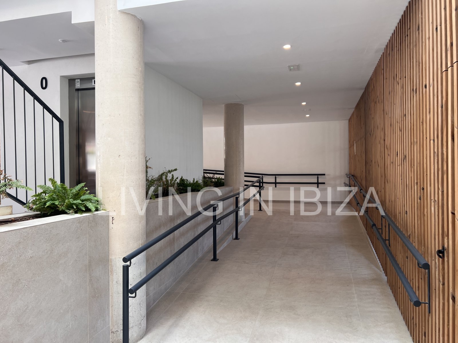 Annual rental. Available 15th July. Attractive and modern new unfurnished flat, with communal pool, parking, in Santa Eulalia, Ibiza.