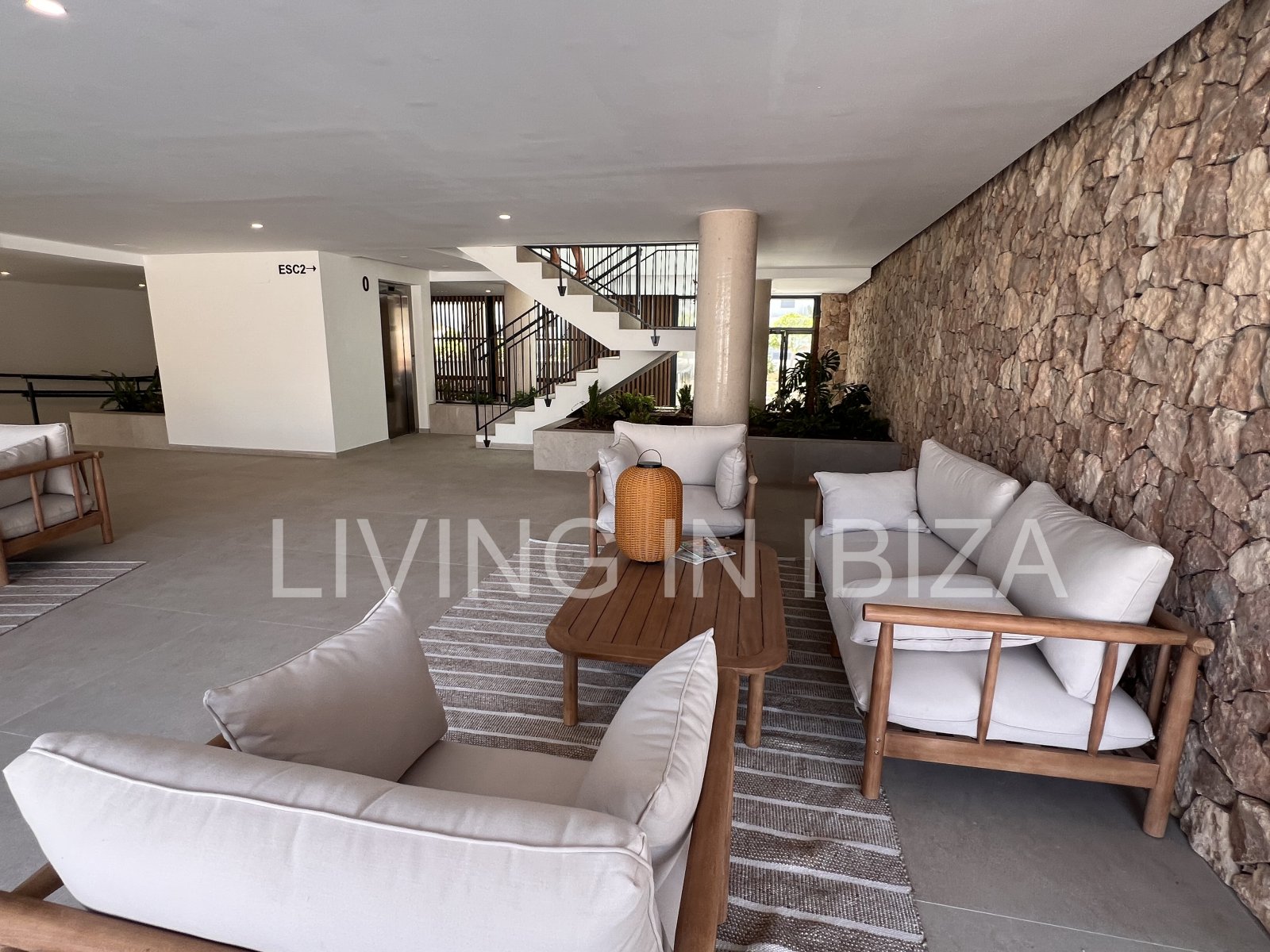 Annual rental. Available 15th July. Attractive and modern new unfurnished flat, with communal pool, parking, in Santa Eulalia, Ibiza.