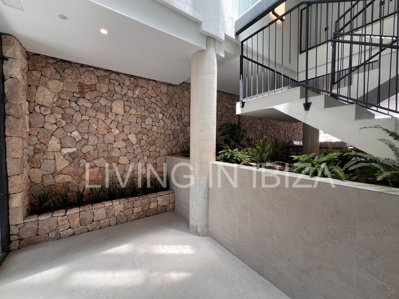 Annual rental. Available 15th July. Attractive and modern new unfurnished flat, with communal pool, parking, in Santa Eulalia, Ibiza.