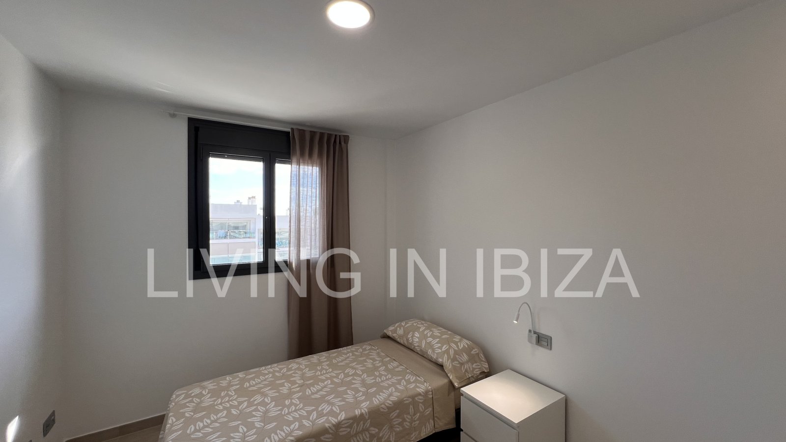 Penthouse Tagomago, is an attractive and modern brand new unfurnished penthouse in a luxury development in the town of Santa Eulalia del Rio