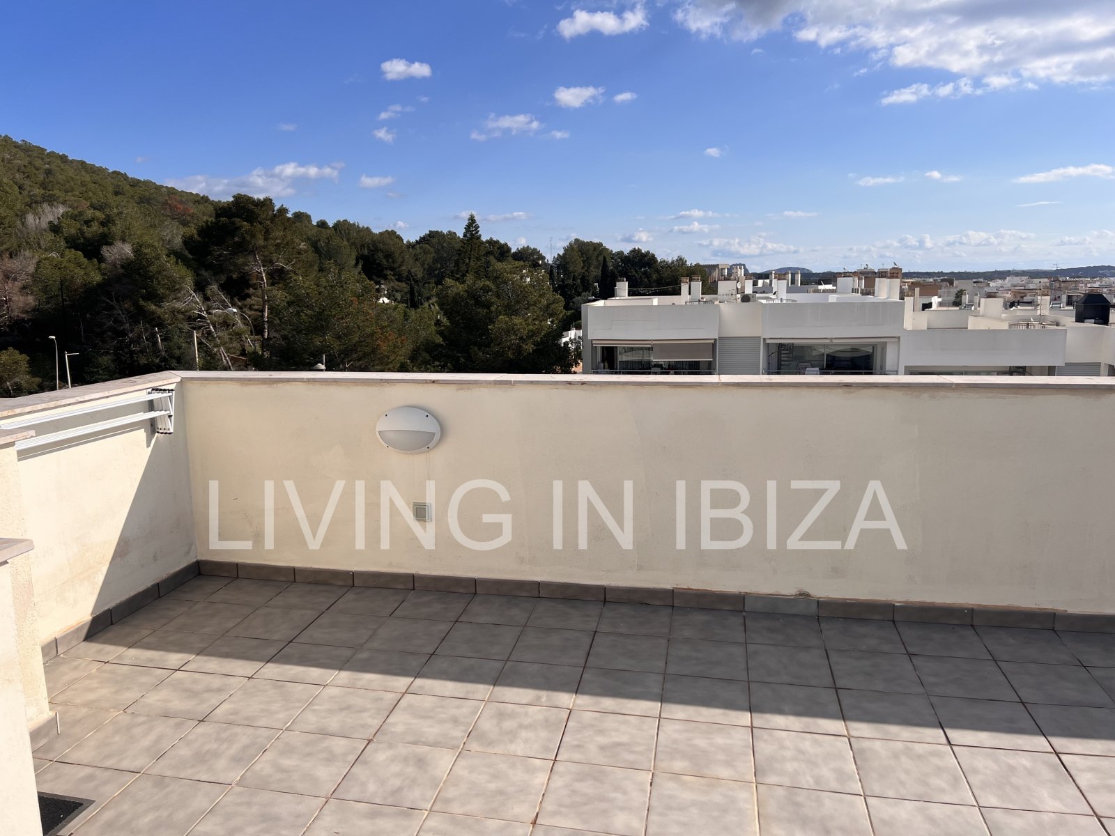 Penthouse Tagomago, is an attractive and modern brand new unfurnished penthouse in a luxury development in the town of Santa Eulalia del Rio