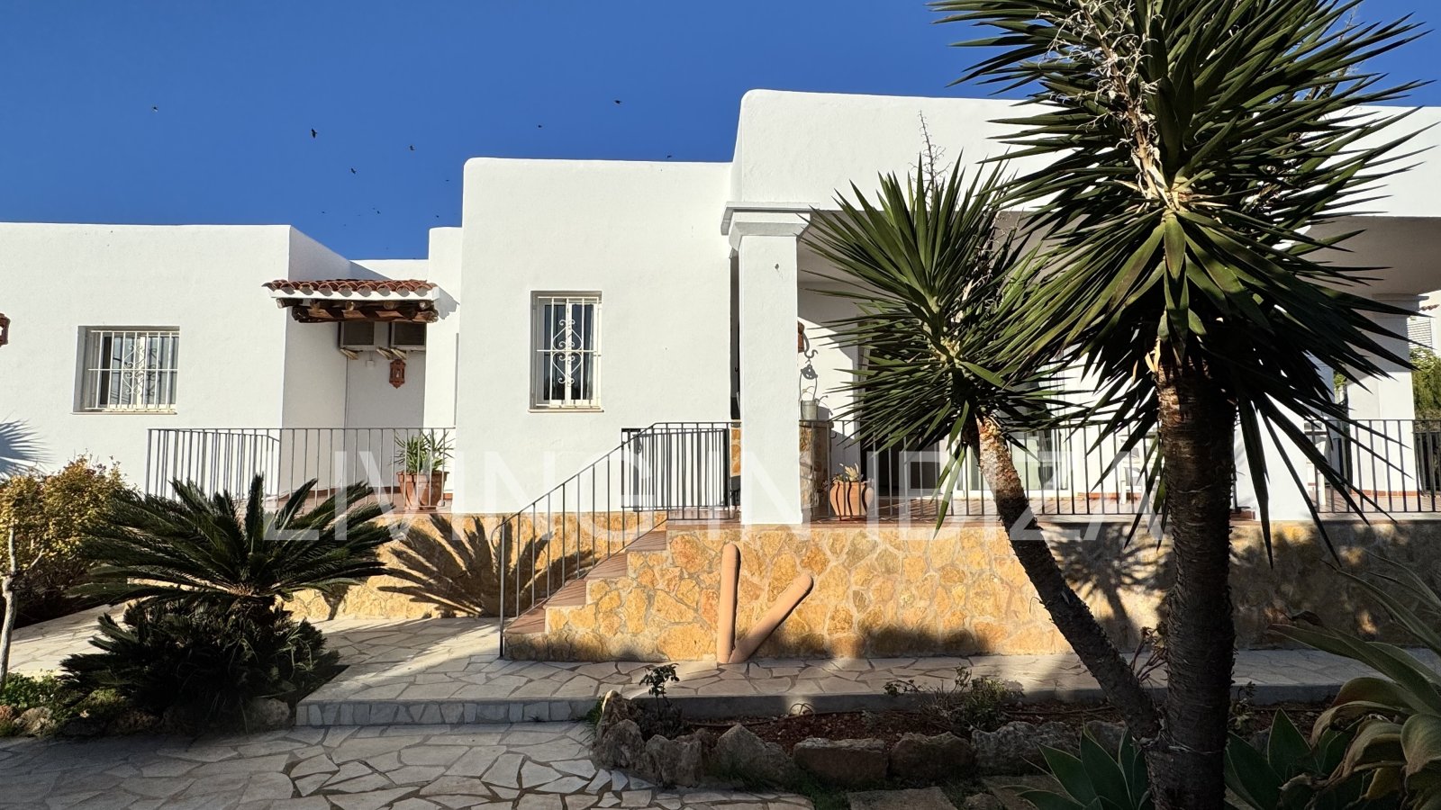 Long-term rental in Santa Eulàlia del Riu, Ibiza. This house offers an ideal setting for year-round living, combining comfort, privacy, and a Medit