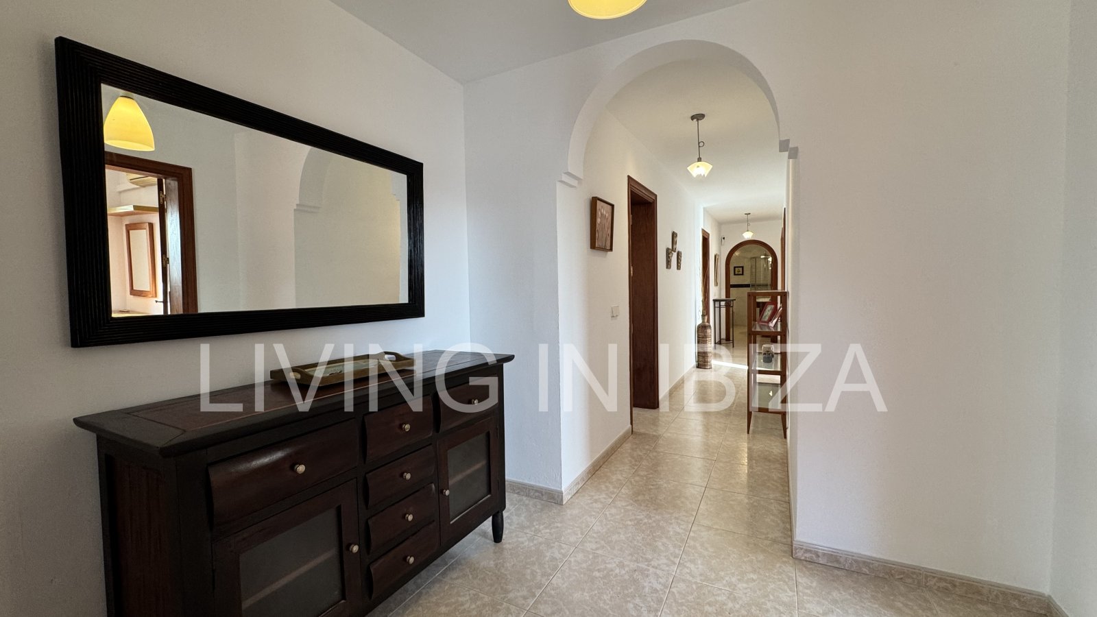 Long-term rental in Santa Eulàlia del Riu, Ibiza. This house offers an ideal setting for year-round living, combining comfort, privacy, and a Medit