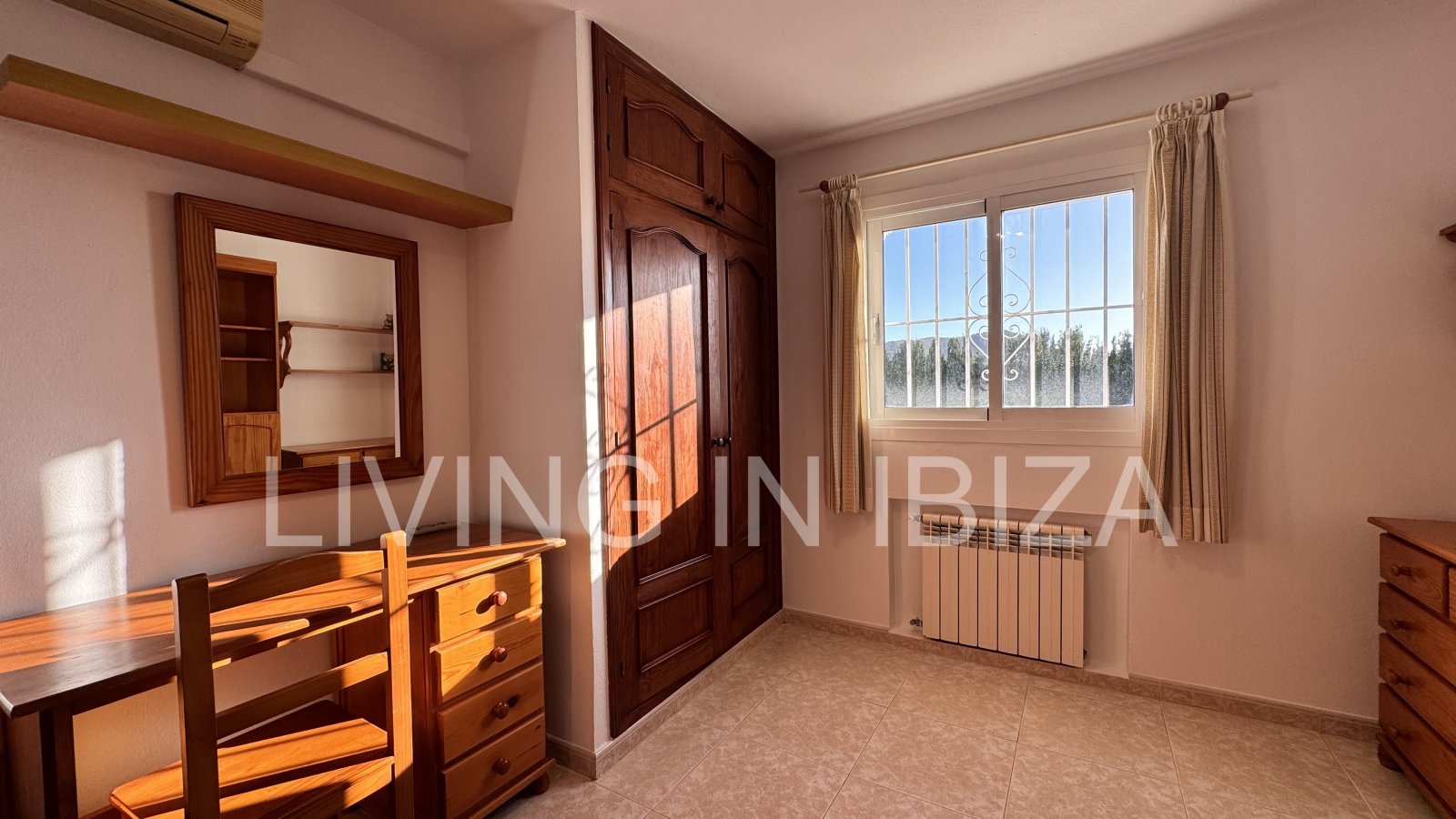 Long-term rental in Santa Eulàlia del Riu, Ibiza. This house offers an ideal setting for year-round living, combining comfort, privacy, and a Medit