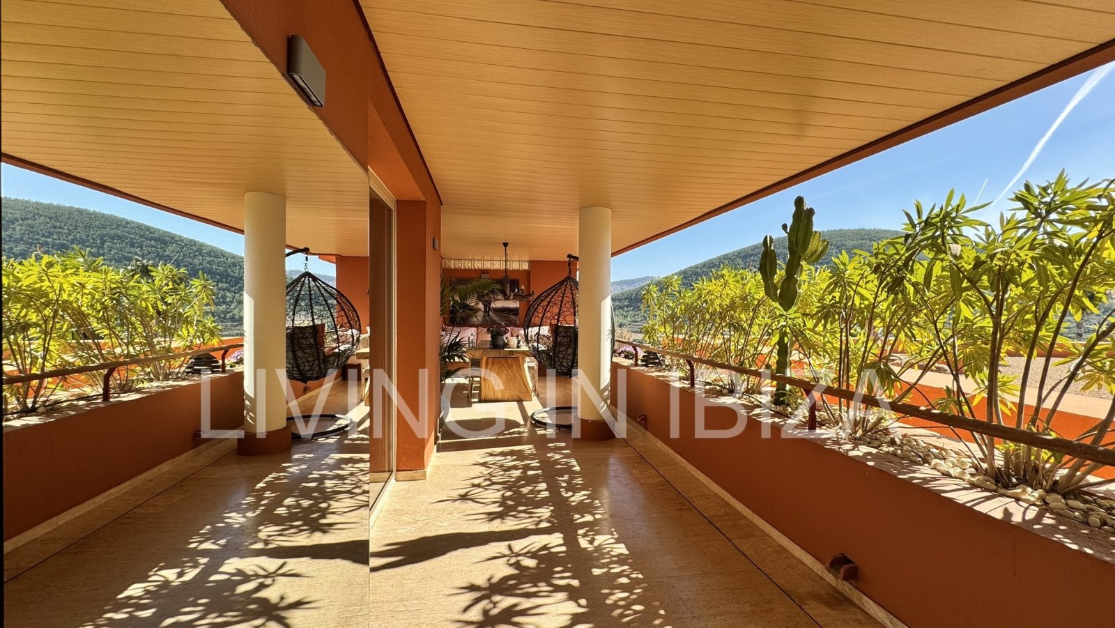 For sale: A flat in Roca Llisa, Ibiza, with a large sun terrace, two bedrooms, a pool, and a parking space.