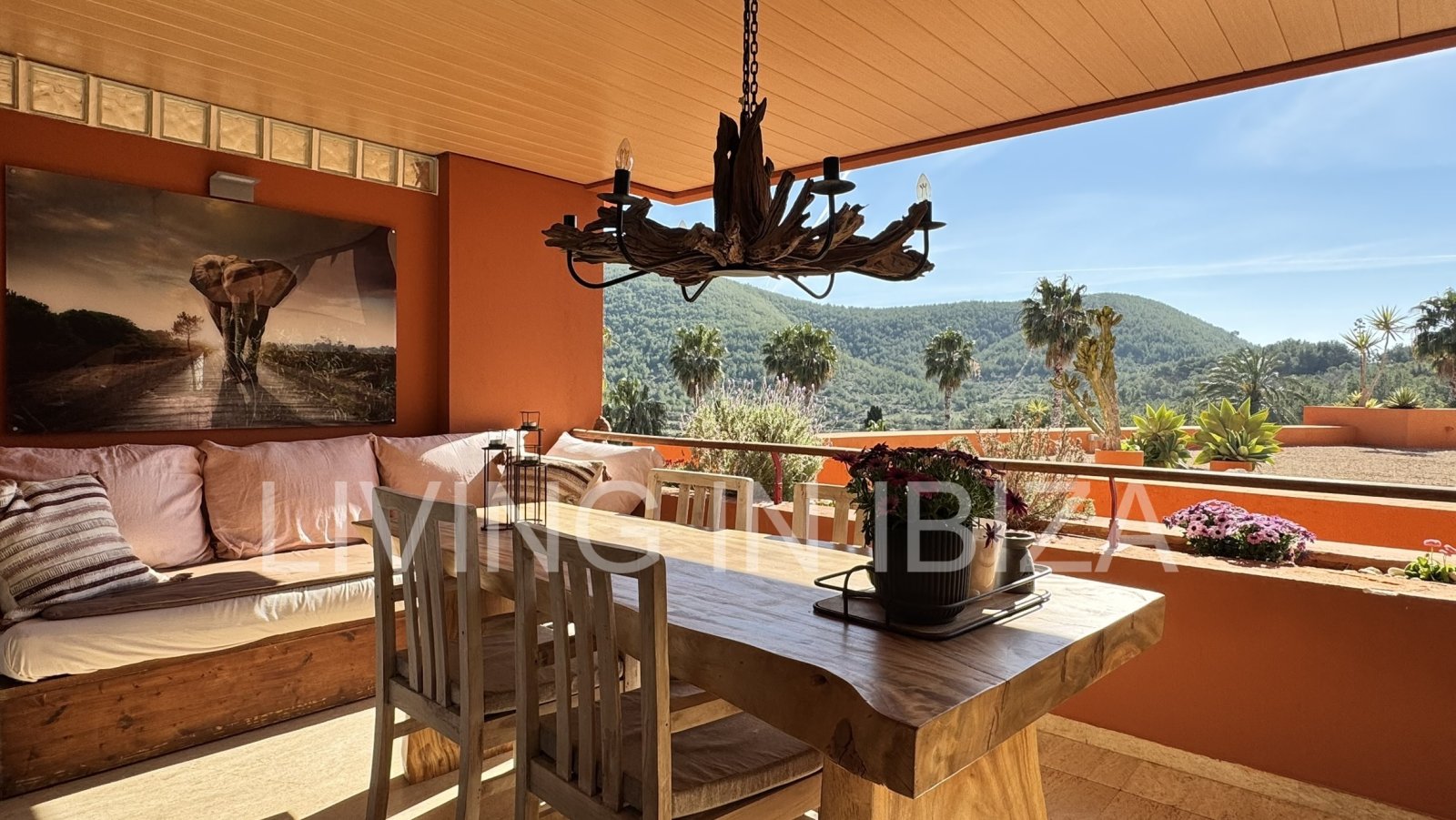 For sale: A flat in Roca Llisa, Ibiza, with a large sun terrace, two bedrooms, a pool, and a parking space.