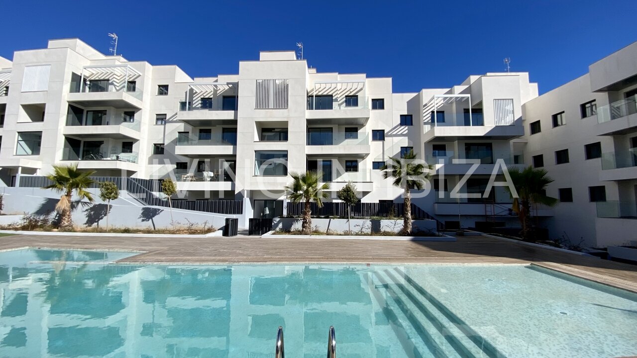 FOR SALE: Exclusive, designer penthouse with distant sea views in Santa Eulalia del Río, Ibiza. Parking, communal pool and storage room.