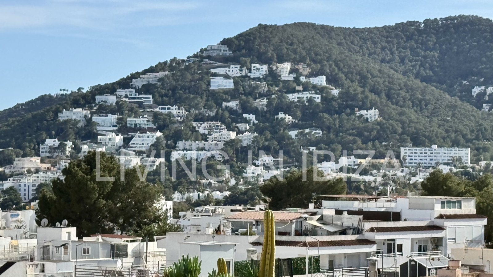 FOR SALE: Exclusive, designer penthouse with distant sea views in Santa Eulalia del Río, Ibiza. Parking, communal pool and storage room.