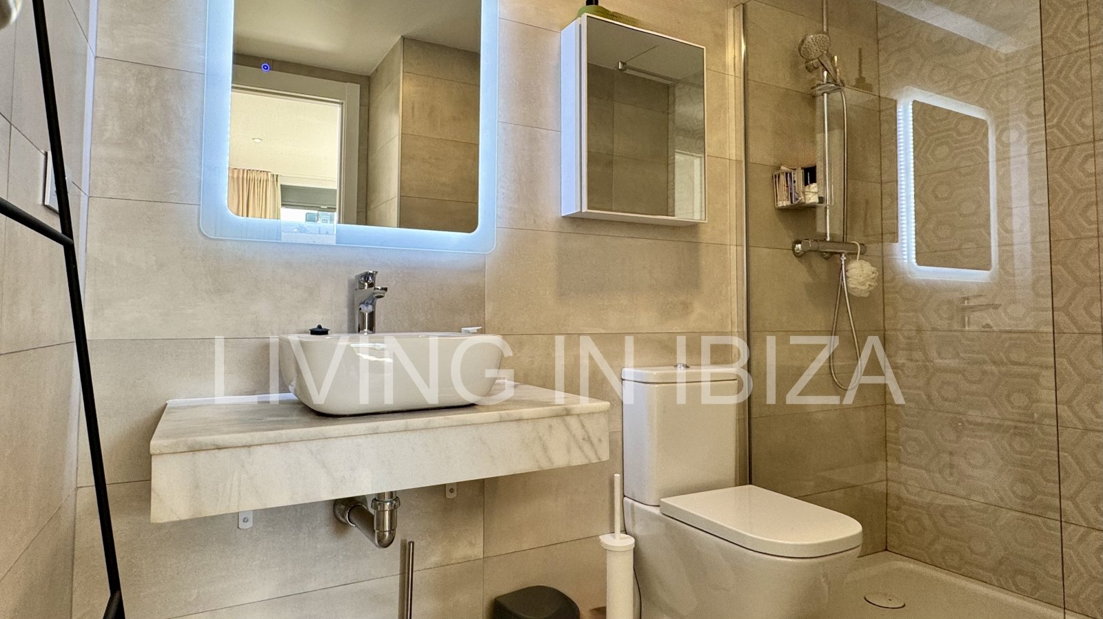 FOR SALE: Exclusive, designer penthouse with distant sea views in Santa Eulalia del Río, Ibiza. Parking, communal pool and storage room.