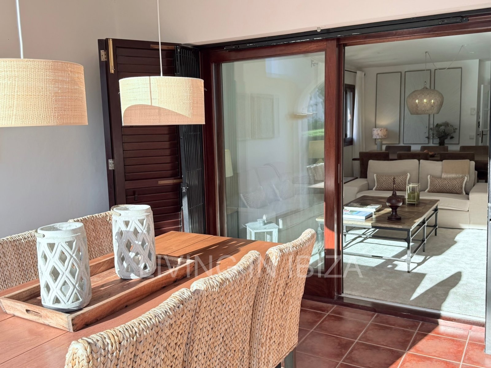 Seasonal rental. Mediterranean elegance in a privileged setting within a seafront residential community in Santa Eulalia del Río, Ibiza.