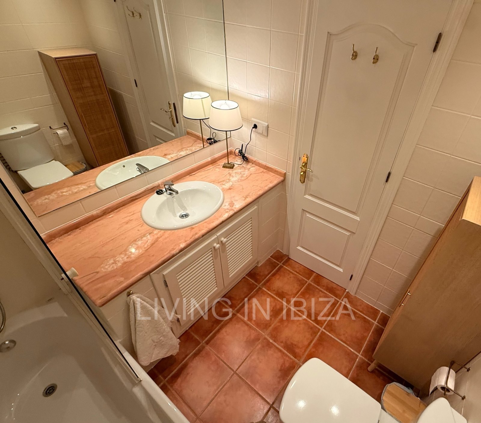 Seasonal rental. Mediterranean elegance in a privileged setting within a seafront residential community in Santa Eulalia del Río, Ibiza.