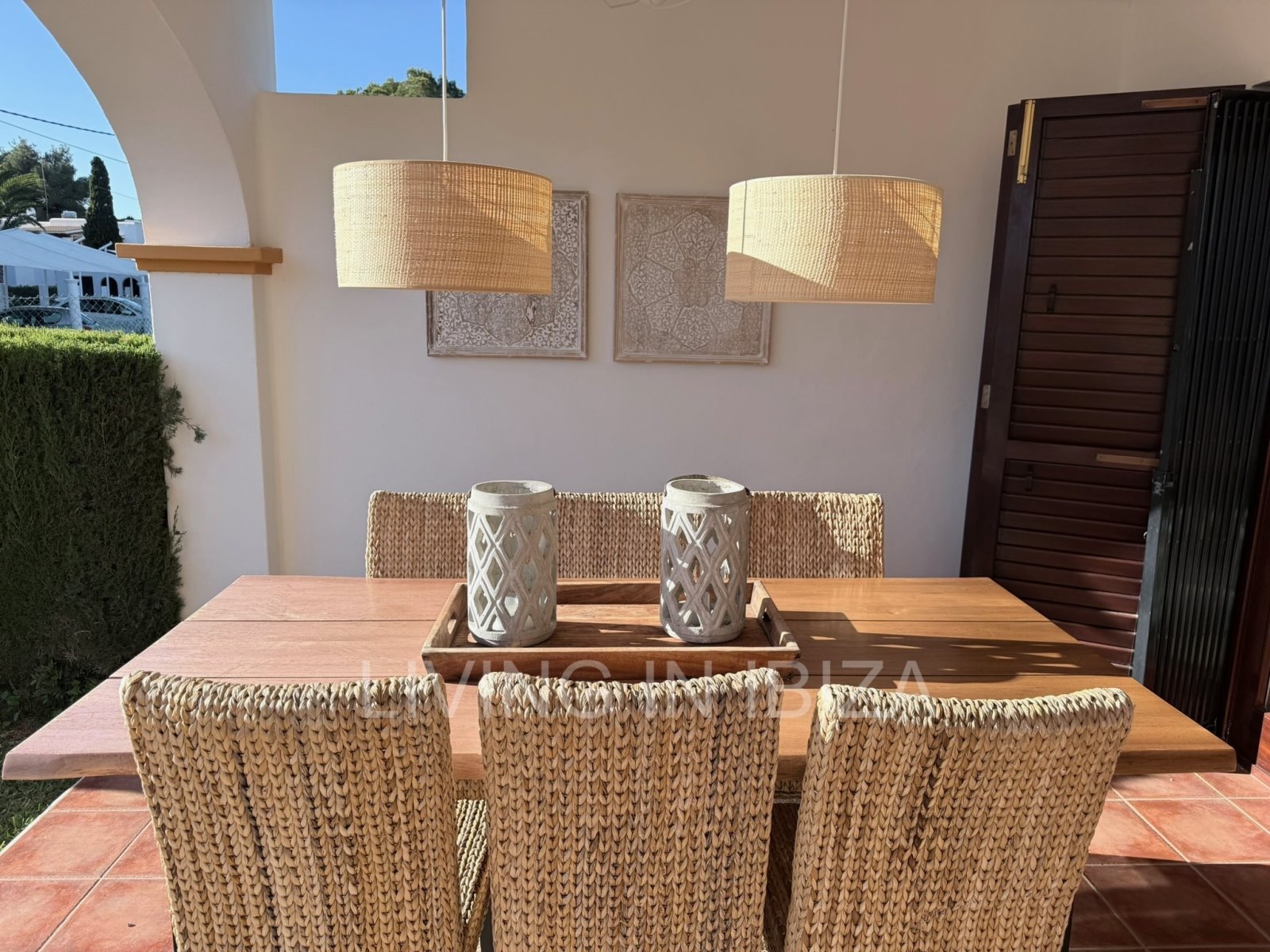 Seasonal rental. Mediterranean elegance in a privileged setting within a seafront residential community in Santa Eulalia del Río, Ibiza.