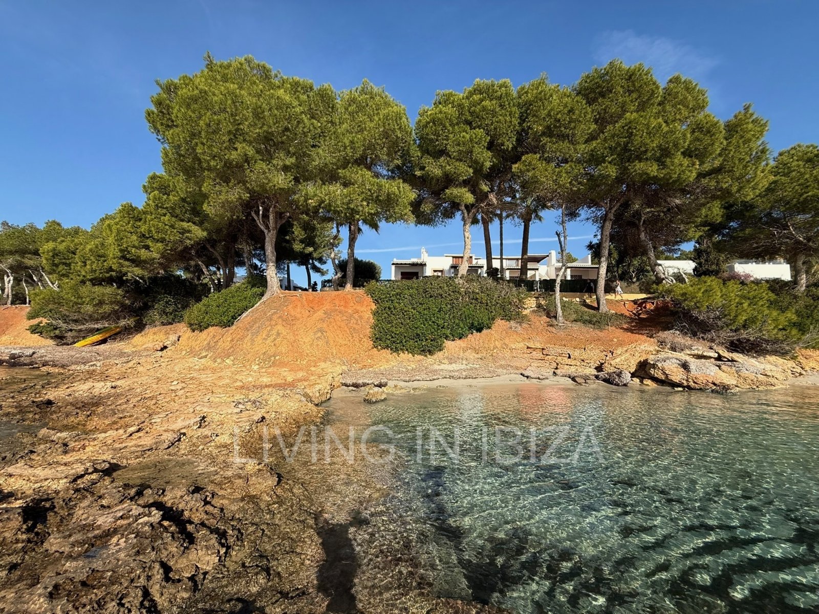 Seasonal rental. Mediterranean elegance in a privileged setting within a seafront residential community in Santa Eulalia del Río, Ibiza.