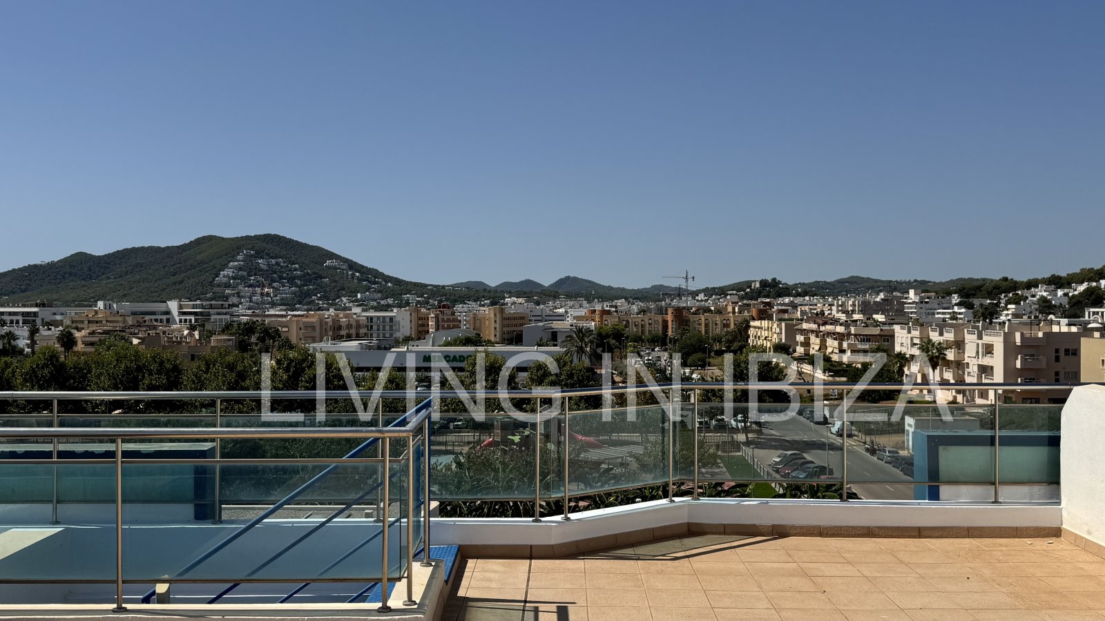 Penthouse for Sale in Santa Eulalia del Río, Ibiza – 100 m² of Terraces, Private Rooftop, Jacuzzi and Large Communal Pool